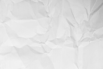 Grunge wrinkled white color paper textured background with copy space. Use for decoration or layer