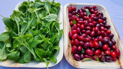 cornelian cherry and lamb's lettuce on a plate