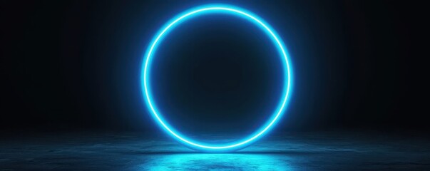 Obraz premium Glowing blue neon circle on black background, vibrant light effect.