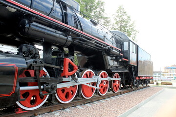 Naklejka premium The retro train stands on the rails.