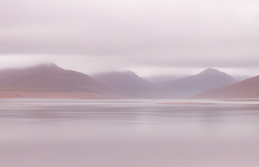 Fototapeta premium mist over the mountains backdrop soft pink