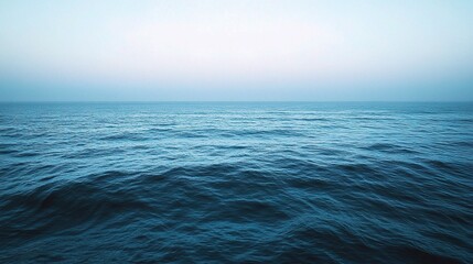 Obraz premium Calm Ocean View Under Soft Blue Sky