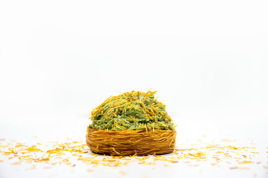 Middle eastern Syrian triangle sweet pastry isolated on white background