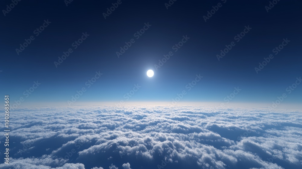Wall mural a tranquil skyscape above thin clouds, deep blue sky with a tiny bright sun just above the horizon