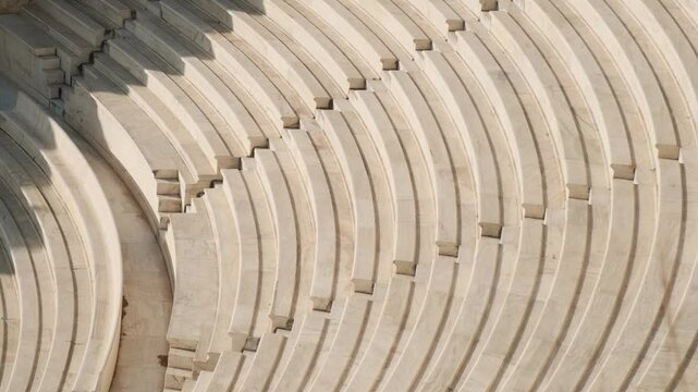 Odeon of Herodes Atticus stone Roman theatre on Acropolis of Athens, Greece. Ancient Greek architecture. Popular travel and touristic landmark