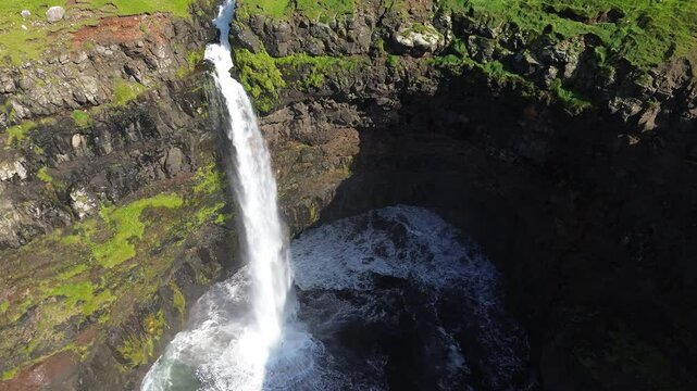 Mulafossur waterfall in Gasadalur village, Vagar Island of the Faroe Islands, Denmark. 