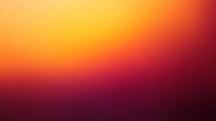 Obraz premium Blurred gradient orange to maroon abstract background