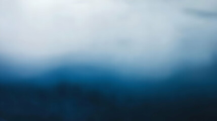 Obraz premium Blurred gradient indigo to silver abstract background