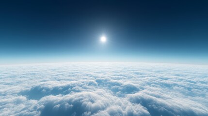 A peaceful scene above thin clouds, with a deep blue sky and a small sun just above the horizon