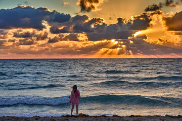 Fototapeta premium Starting the day with a peaceful beach walk, Nothing like the sound of waves and fresh sea breeze to clear the mind and nourish the soul. 