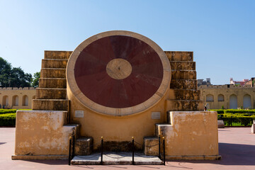 A historic astronomical instrument at Jaipur’s Jantar Mantar, showcasing ancient scientific advancements in timekeeping and celestial observations.