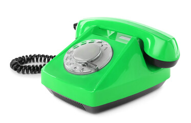 Old green telephone with rotary dial isolated on white