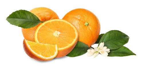 Fresh ripe oranges and green leaves on white background. Citrus fruit