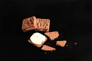 stuffed biscuit, flour biscuit healthy food snack isolated on black background with space for text