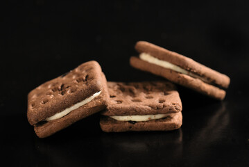 stuffed biscuit, flour biscuit healthy food snack isolated on black background with space for text