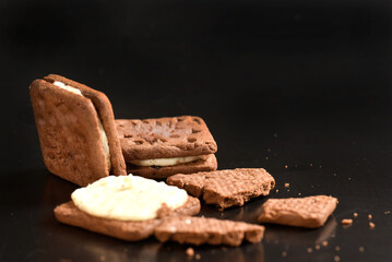 stuffed biscuit, flour biscuit healthy food snack isolated on black background with space for text