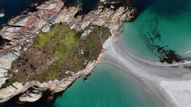 Ascending from Diamond Island with sandbar towards beach on a sunny day, aerial shot