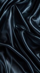 Obraz premium The smooth, silky texture of satin fabric with soft folds and gentle highlights, capturing the elegant movement and shine, luxurious material, refined texture