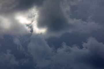 Gathering Storm Clouds Illuminated by the Sun