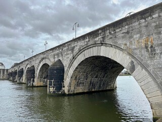 Fototapeta premium The old Servaasbrug over the river Maas in the historic centre of Maastricht.