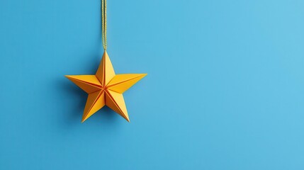 Obraz premium Origami star ornaments made from shimmering metallic paper, tied with golden threads, origami stars, holiday gift
