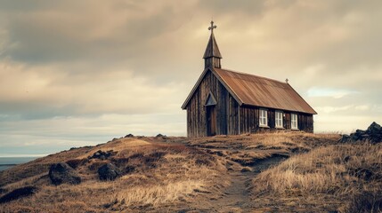 An old wooden church on a hill in Iceland, processed with a vintage effect, evoking timeless faith and solitude