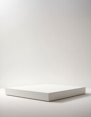 White low pedestal for product display - on a light background