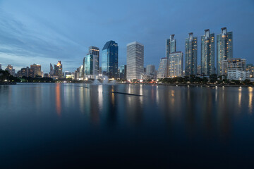 Fototapeta premium Twilight time at the business district from Benjakiti Park Bangkok , Thailand