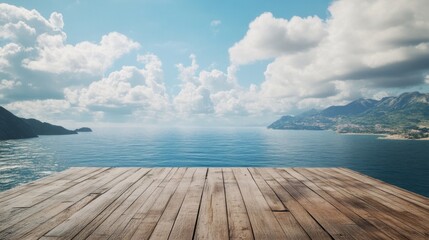 Fototapeta premium A wooden platform with no railings, looking out over an expansive ocean