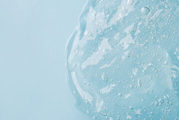 Transparent Skin care Product on Blue Background