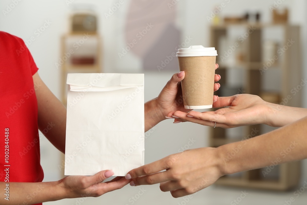 Canvas Prints Fast-food worker giving customer's order indoors, closeup