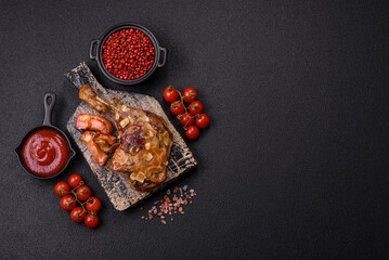 Duck leg baked with apples and sauce