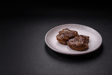 Juicy beef steak grilled with salt, spices and herbs