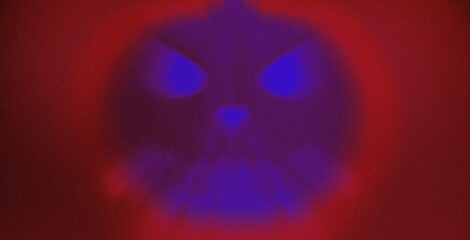 Halloween pumpkin faces with a scary expressions. Scary psycho evil face on dark background, exorcist. Horror Spooky Wallpaper With Monster. Colorful digital grain soft noise effect Nostalgia