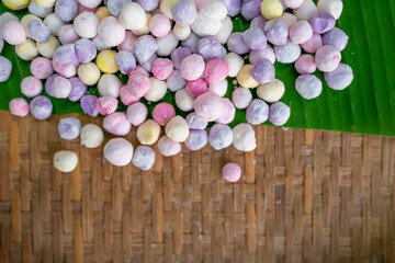Obraz premium Thai dessert Raw Bua Loy balls in many colours. Thai dessert made of glutinous rice, glutinous rice, glutinous rice ball