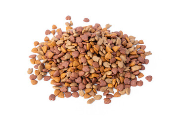 Pet treats with contains essential flavors and nutrients. Cat crunchy biscuits. Pile of dry cat food pellets come in heart, triangle and fish shapes isolated on white background.
