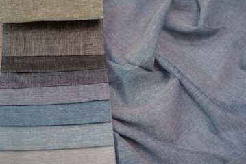 Gray blue fabrics for curtains with linen texture. Fabrics for interior decoration.