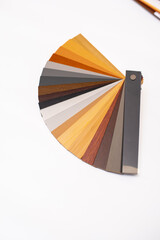Samples of wooden blinds for windows in a store.