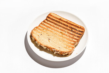 grilled toast on a white plate
