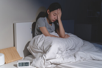 Anxiety disorder on insomnia woman concept, sleepless Woman open eye awakening on the bed at night...