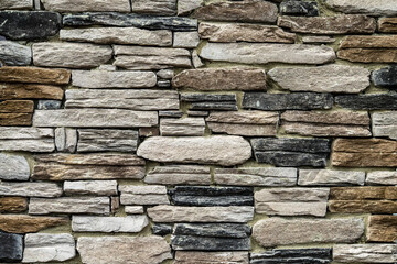 Stacked stone wall