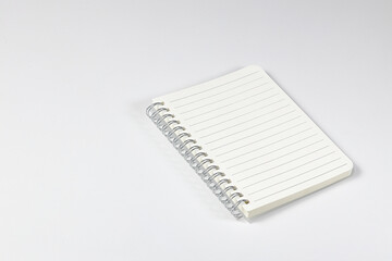Ring-bound notebook or appointment book isolated on white background. Stationery item.