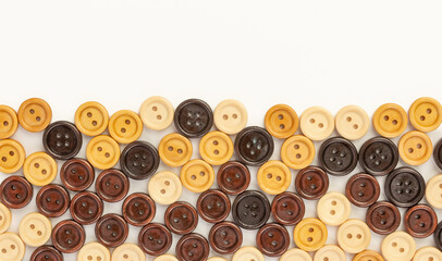 White background with wooden multicolored buttons