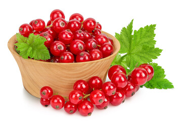 Red currant berries in a wooden bowl isolated on white background