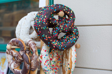 New Year's fair, sale of pretzels and hot tea. Christmas toys and an elegant Christmas tree