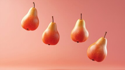 Pears floating on pink background