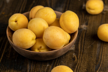 ripe soft apricot fruits on the cutting board