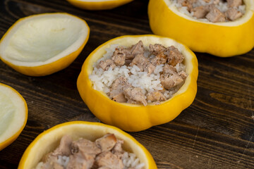 peeled and cut pumpkins on top for baking with meat and rice