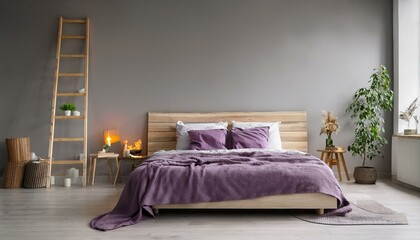 A minimalist Scandinavian bedroom with a light wooden bed dressed in deep purple bedding, a