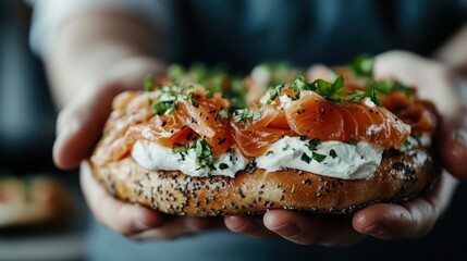 A close-up shot of a poppy seed bagel topped generously with cream cheese, smoked salmon, and fresh greens, capturing a delightful culinary moment in perfect detail.